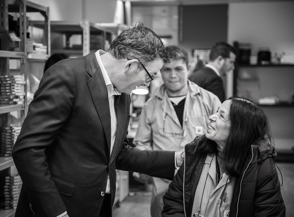 VIC Premier Daniel Andrews having a conversation with MTData Employee